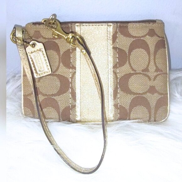 Coach Handbags - Coach gold trimmed wristlet w/hangtag EUC